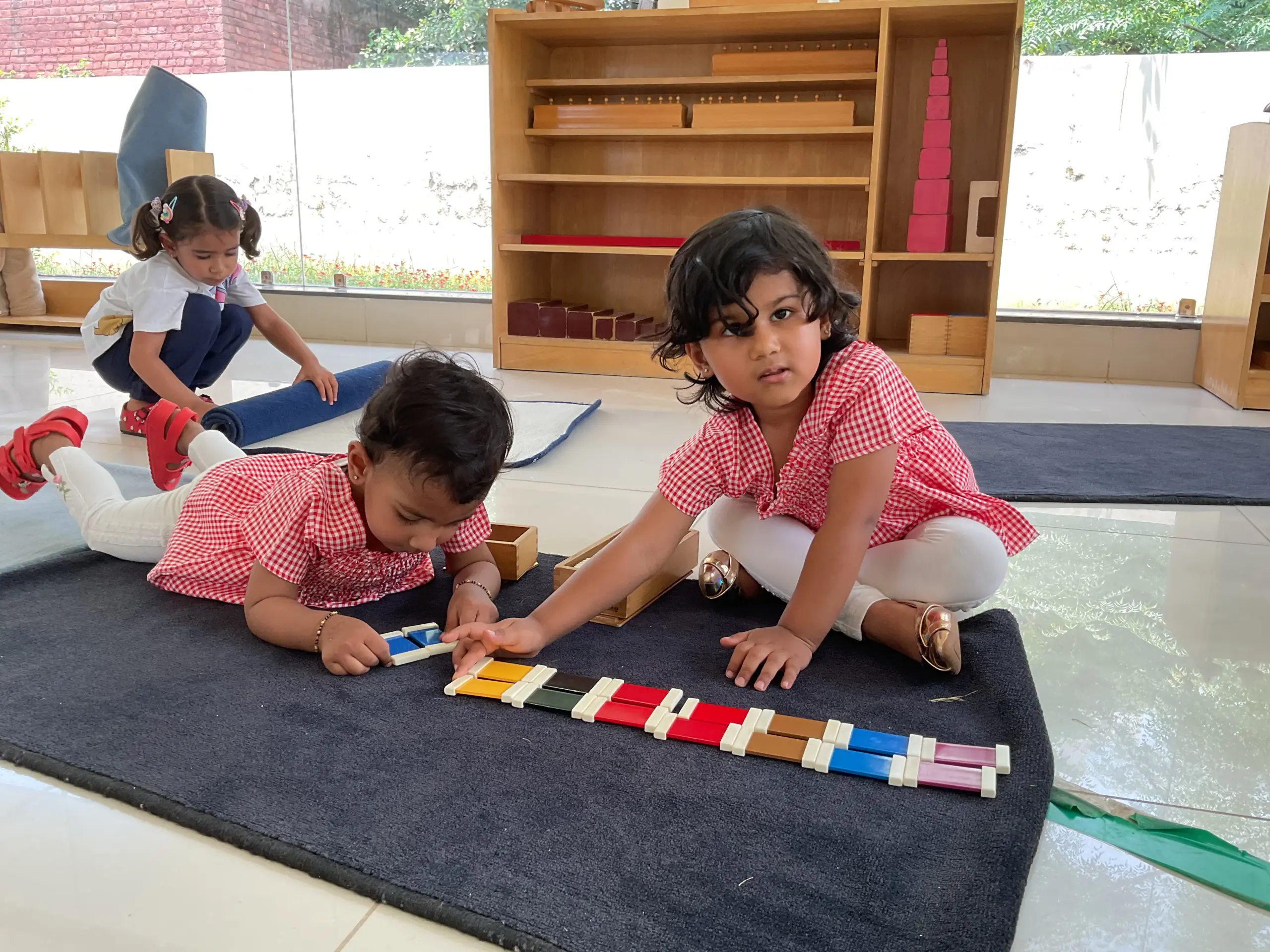 Hands-on sensorial exploration at a Montessori school near me in Gurgaon