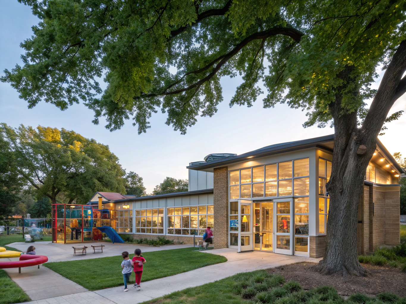 Expansive green grounds and sunlit Montessori building at Malibu Towne campus